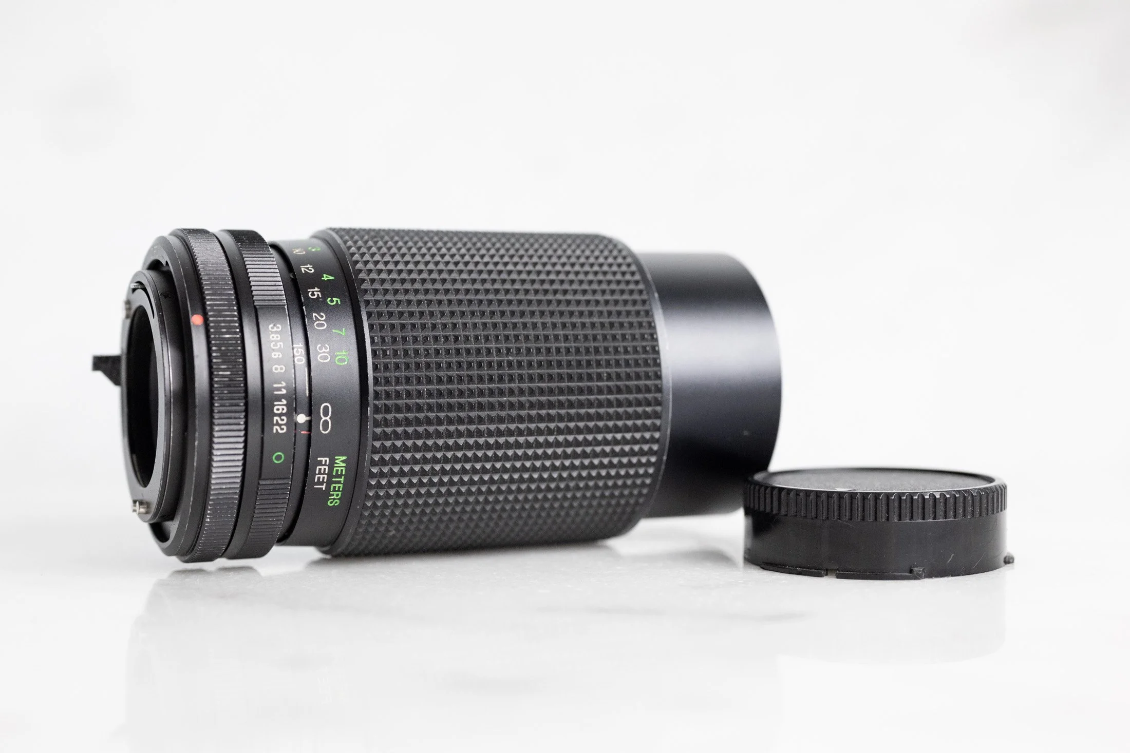 Canon FTb 十 canon zoom lens FD 70-150mm Canon Zoom Lens FD 70-150mm F/3.8 by Vivitar with Rear Cap